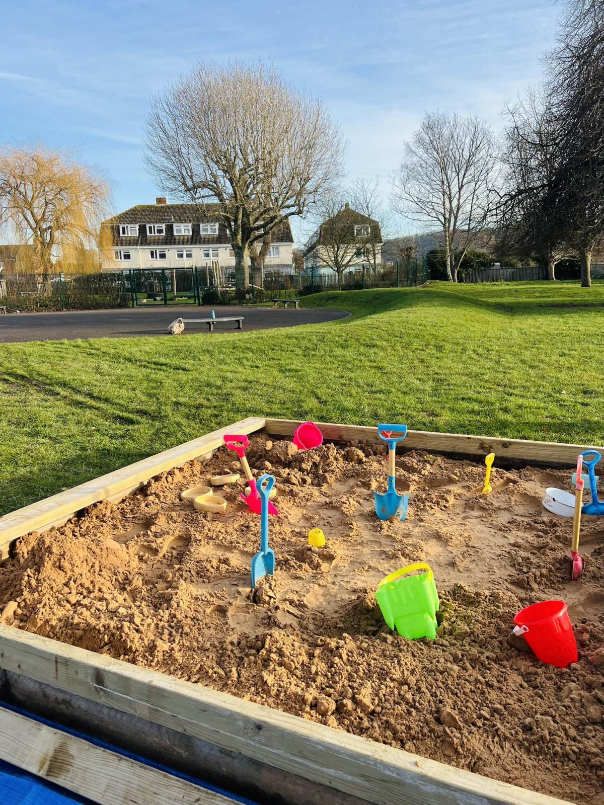 Sandpit with buckets and spades